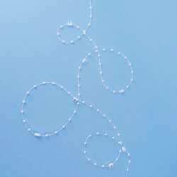 Цепь нижняя дистанционная пластиковая для 127 мм ламелей вертикальных жалюзи